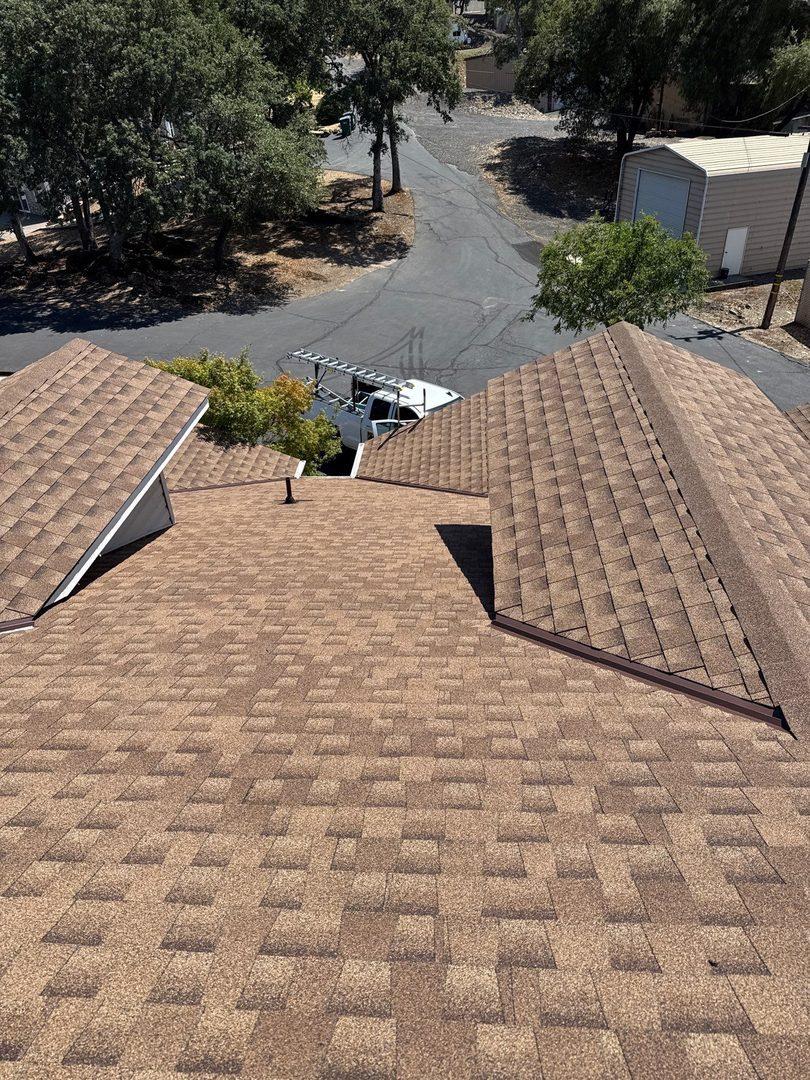 Overhead view of completed multi-hip roof replacement in Jamestown, CA