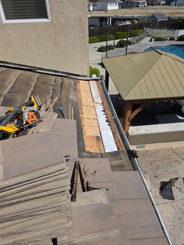 OSB patch and new step flashing at gutter line