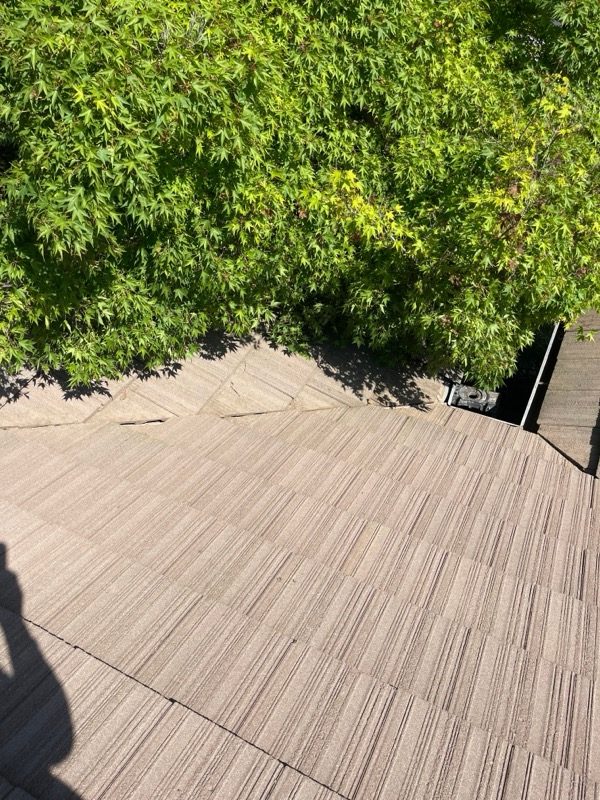 Wide view of completed tile roof repair, clean and uniform